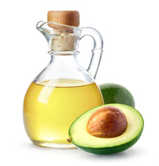 Bottle of avocado oil and fresh avocado halves on white background - 746551064