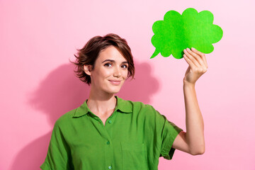Photo portrait of attractive young woman hold paper cloud comics dressed stylish green clothes...