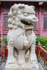 Guarding lion at the temple of the Tianhou Palace in Tianjin, China