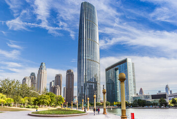 Riverside park and World Financial Center in the center of Tianjin, China