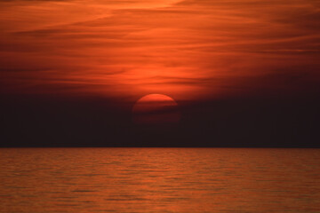 sunset over the sea horizon