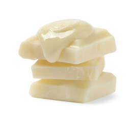 Pieces of chocolate and tasty paste isolated on white