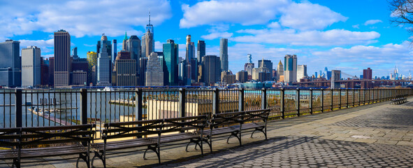 Panoramic New York City Lower Manhattan Skyline and skyscrapers over the East River, the view from...