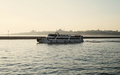 city ferry and skyline of the city