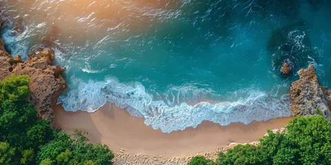 Foto op Canvas Breathtaking aerial view of a secluded beach cove, with crystal-clear turquoise waters surrounded by lush greenery and rugged cliffs.. © bajita111122