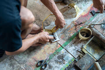 Craftsmen of traditional muslim lantern lamps in Cianjur are called "Lampu Gentur". Lampu Gentur are one of the handicraft products that are characteristic of Cianjur, Indonesia.