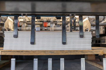 Printed sheets of paper are served in the printing press. Offset , CMYK. Offset printing machines....