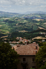 Fototapeta na wymiar a breathtaking view from above of the houses and nature of San Marino