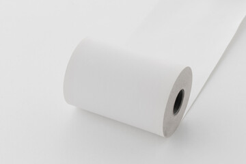 unwound paper roll, copy space, on white background.
