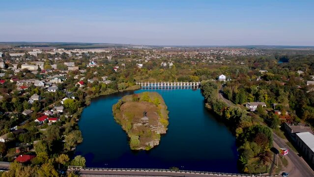 Aerial view. Scenic islands and bridges on the Ros River. Flight over the picturesque Ros River. Korsun, Cherkasy region, Ukraine.
