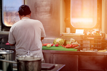 Chef Person In The Kitchen. Chief Cook In The Galley On Board Merchant Ship