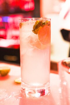 cocktail in a bar with ice, mint and lime 