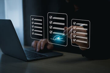 Electronic signature or checking list, Business man using pen checking digital virtual screen...