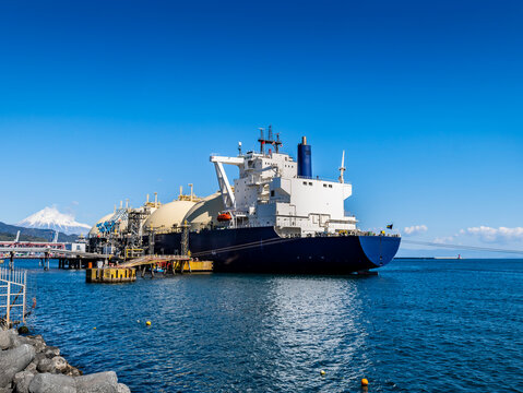 scene of LNG LNG tanker unloading using unloading arm at shimizu port in shizuoka japan.,
