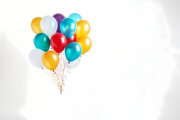 A whimsical arrangement of birthday balloons in various sizes and colors, forming a playful cluster on a clean white surface, leaving space for custom text.