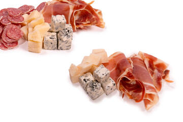 Cheese, olives, salami, jamon isolated on a white backgrund.