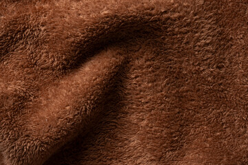 Texture of a brown faux fur as a background.