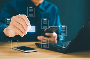 Businessman using computer to take survey, online checklist, fill out digital form checklist Electronic document management