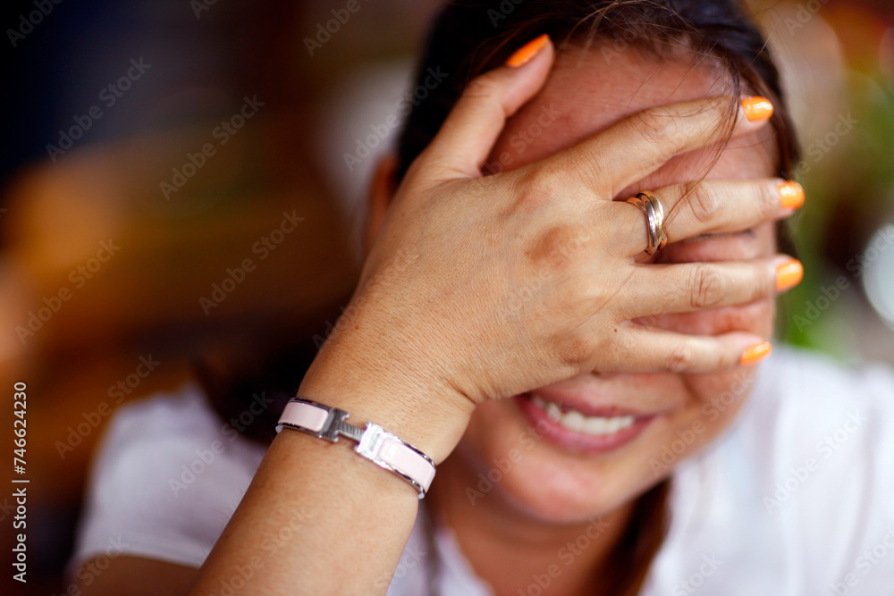 Sticker playful shy woman hiding face with her hand. .