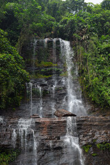 Scenic view of waterfalls. Waterfall in the tropical jungle, nature landscape.