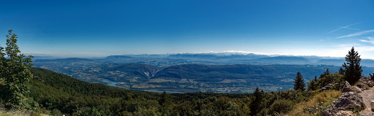 Fototapeta na wymiar Panorama from Grand Colombier summit (France) on a clear summer day, looking northeast, towards Alps and Switzerland