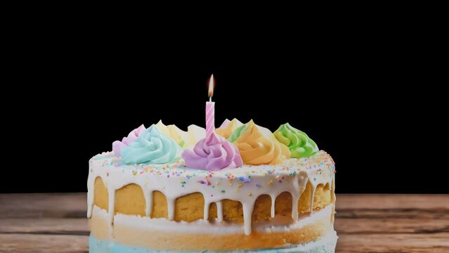 A delicious birthday cake and a animated burning candle on it. Alpha channel PNG codec (only original 4K version) transparent background.  Streamlabs OBS Overlay. Celebration, Party, Birthday concept