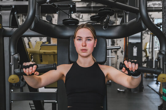 Gym.Fitness woman working out in the gym, doing exercises for health and beautiful figure.fitness in gym,fitness girl,fitness,fitness,mental health,active lifestyle,self-care,health,wellness,fitness