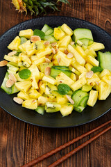 Vegetarian pineapple and cucumber salad.