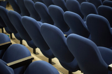 Obraz premium Blue seats in hall. Rows of seats. Cinema Details.