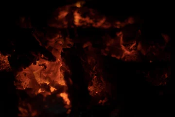 Fototapeten Fire flame. Flame texture. Burning firewood in stove. © Олег Копьёв