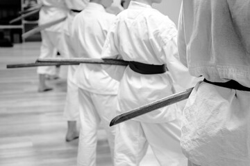 Silhouettes Practicing Martial Arts with Bokken — Black and White Background for Traditional...