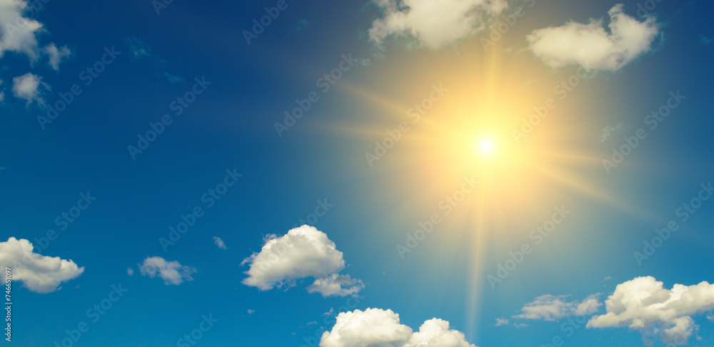Wall mural bright sun on beautiful blue sky with white clouds. - Wall murals