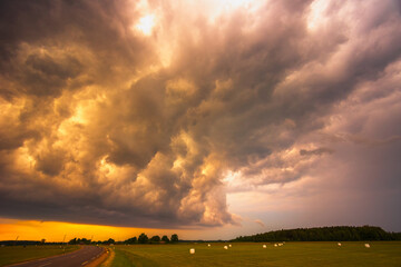 Angry supercell storm influenced by Climate change. Dangerous storm supercell shelf cloud with...