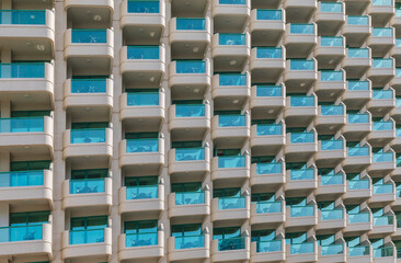 Glass balconies of the building. Architectural geometry