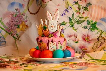Celebration cake with Easter bunny and colorful eggs