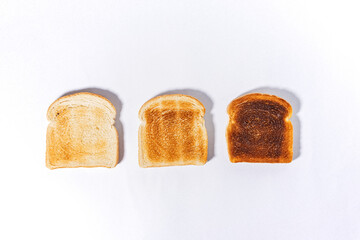 Three slices of bread toasted for a different level