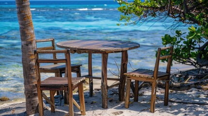 wooden cafe table and chairs on a tropical beach, overlooking the blue sea. An idyllic scene for outdoor dining and relaxation.