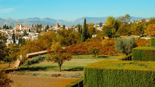 The Alhambra Palace seen from the Generalife Gardens in Granada, Andalucia, Spain, blending architectural majesty with natural beauty