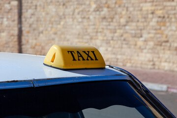 Moroccan yellow taxi sign