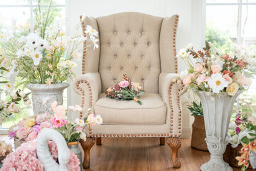 Interior of armchair decorated with Beautiful flowers for wedding ceremony.