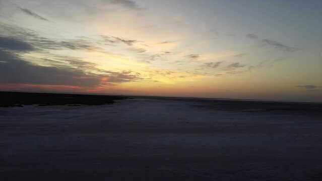 video a drone shot at sunrise over the large salt flats of cordoba / santiago del estero in argentina