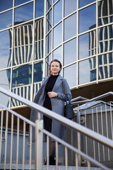 YOUng happy businesswoman outdoor in sunny day