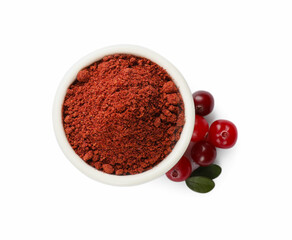 Dried cranberry powder in bowl, fresh berries and green leaves isolated on white, top view