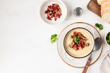 White cream soup with bacon