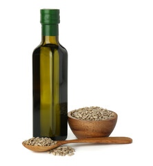 Vegetable fats. Sunflower oil in glass bottle and seeds isolated on white