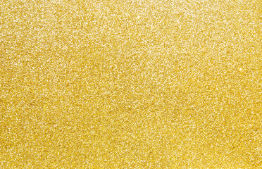 Golden glitter paper texture as background