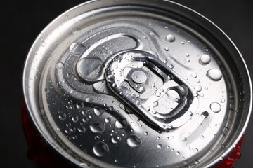 Energy drink in wet can, closeup. Functional beverage