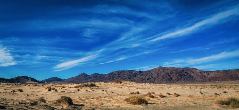 Las Vegas, United States - February 24 , 2013 : The dry desert countryside next to the road during the day between las vegas and los angeles