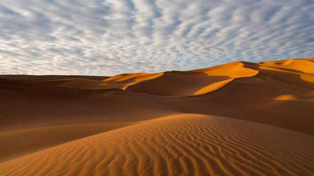 Timelapse of sunny day over the sand dunes in the desert. Rub' al Khali desert