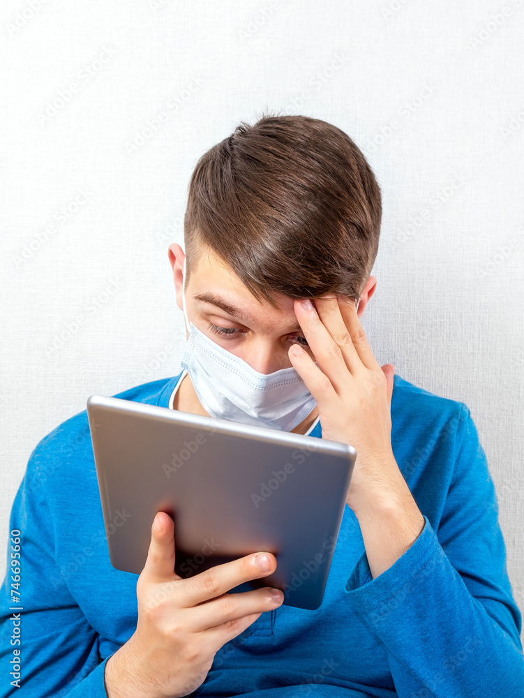 Poster young man with a tablet computer